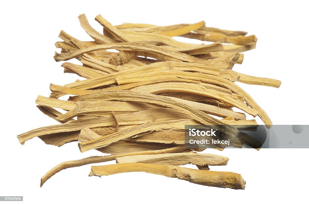 cut dried root cut dried root isolated on white background Ginseng Stock Photo