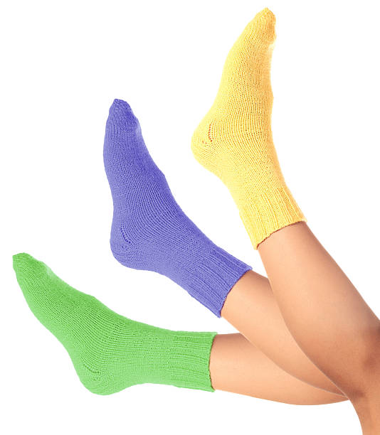 istock woman legs in woollen socks 177417599