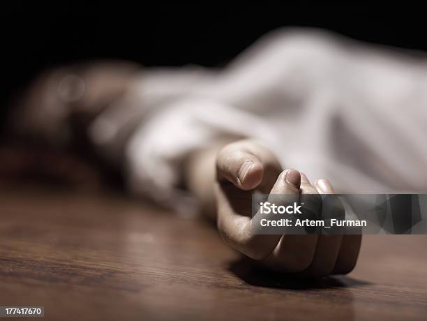 Dead Womans Body With Focus On Hand Stock Photo - Download Image Now - Dead, Dead Person, Murder