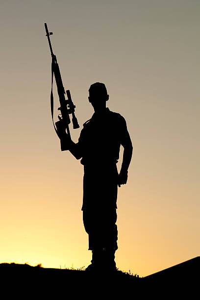 istock Soldier Holding Rifle 177418282