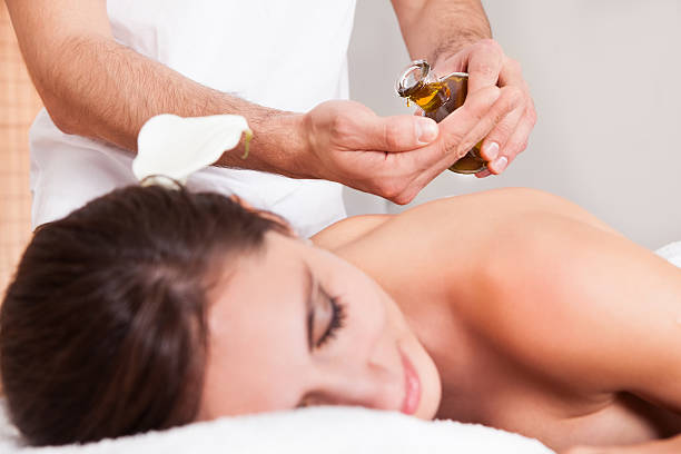 istock Beautiful young woman getting back massage 177418363