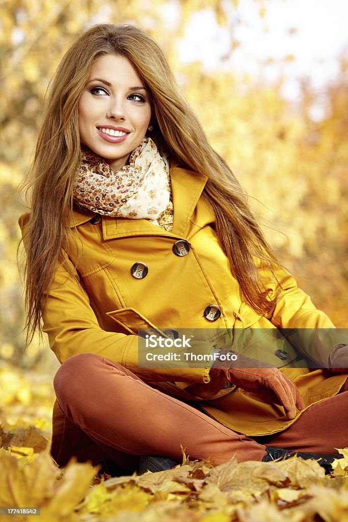 young brunette woman portrait in autumn color Adult Stock Photo