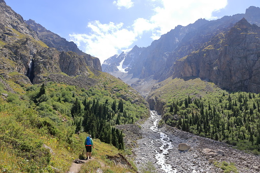 August 19 2023 - Ala Archa national park, Kyrgyzstan in Central Asia: people enjoy hiking in the Ala Archa national Park in summer