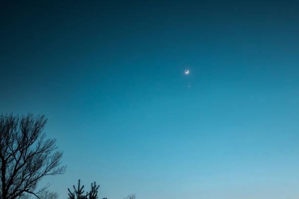 istock Real sky with stars and crescent. Crescent moon with beautiful sunset background . Light from sky . 1774193986