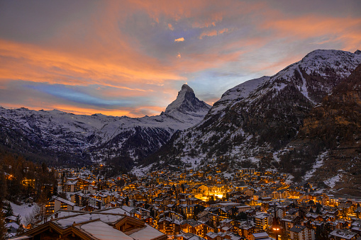 World famous Zermatt town with Matterhorn peak in Mattertal, Valais canton, Switzerland, at dusk in winter