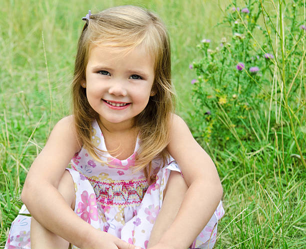 istock Cute little girl on the meadow 177419795