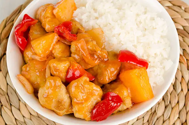 Chinese style sweet and sour chicken and steamed rice.