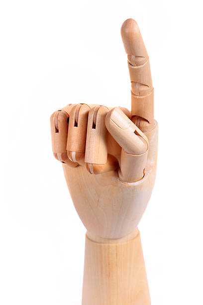 istock Wooden dummy hand point sign isolated 177420155