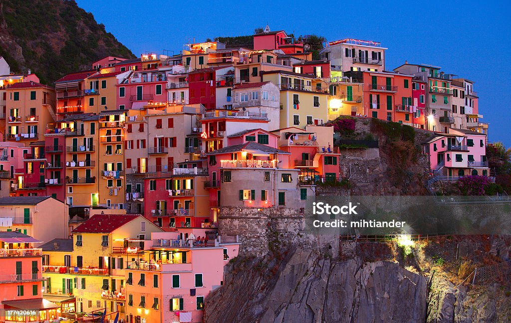 Italian town Manarola town at night. Cinque Terre national park. Italy At The Edge Of Stock Photo