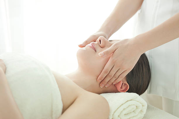 istock The beautician who massages a face 177420823