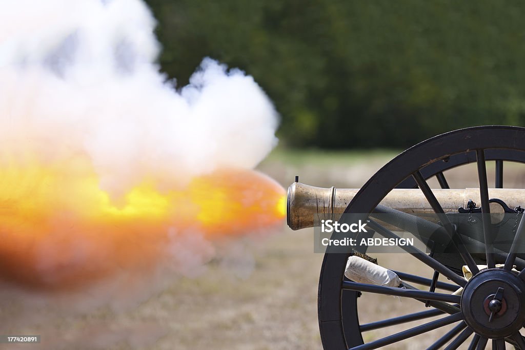 Civil War Cannon Firing A close up shot of a Civil War cannon firing at a civil war re-enactment. Cannon - Artillery Stock Photo