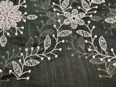 Sari fabric design fabric closeup with backlight.