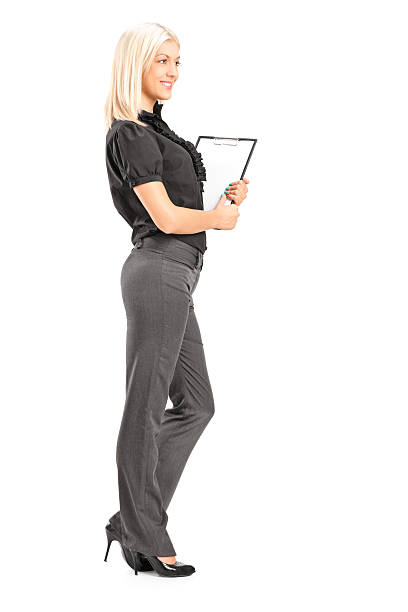 istock Young woman holding a clipboard 177421538