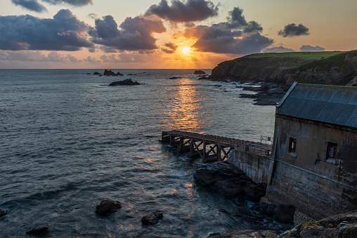Beautiful Summer sunset landscape image of Lizard Point in Cornwall UK during colourful dusk