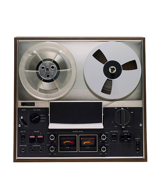 viantage analogue track recorder An old analogue track recorder (1970's) on withe background, isolated. HD photo. reel to reel tape stock pictures, royalty-free photos & images