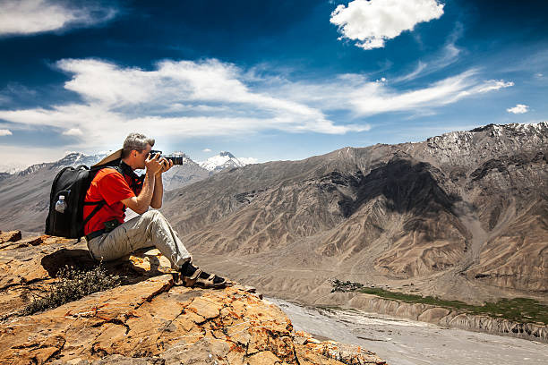 istock Photographer on the high mountain 177423127