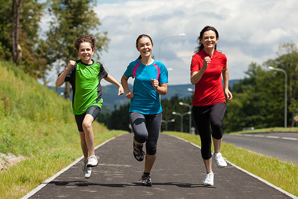 istock Mother with kids running outdoor 177423889