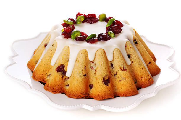 istock Traditional Christmas fruit cake isolated on white background. 177424171