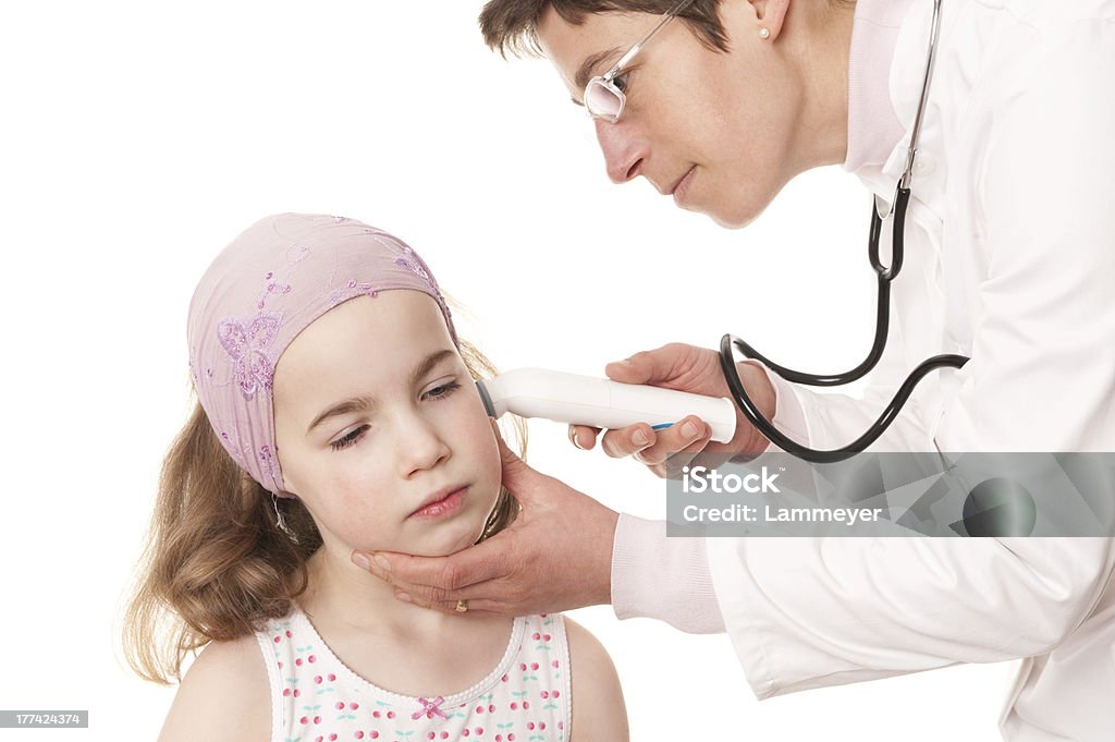 Pediatrician Full isolated studio picture form a little girl and a pediatrician Adult Stock Photo