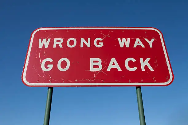 Photo of Wrong way go back sign