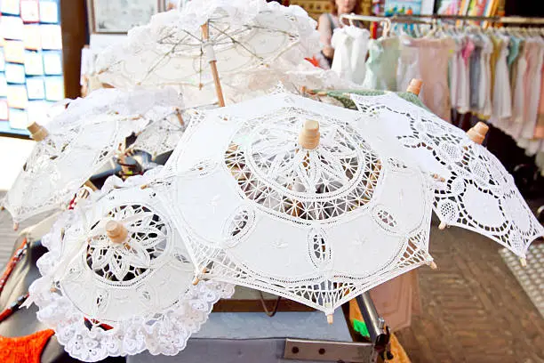 "lace umbrellas for sale in Burano, Venice, Italy"