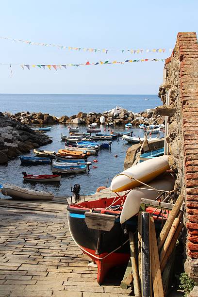 Colorful boats in Riomaggiore stock photo