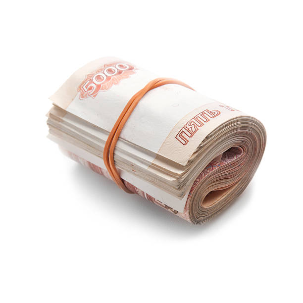istock Roll of Russian money with rubber band, 5000 notes Isolated 177425748