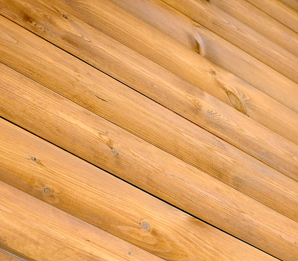 diagonale tavole di legno - knotted wood plank wall abstract texture foto e immagini stock