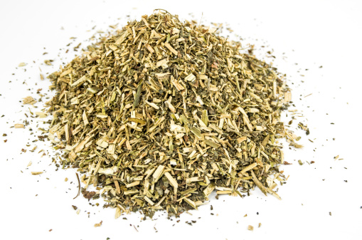 Heap of dried catmint on white background