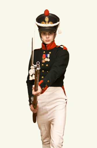 Young boy in uniform of soldier of Russian army in XIX century during war with Napoleon.