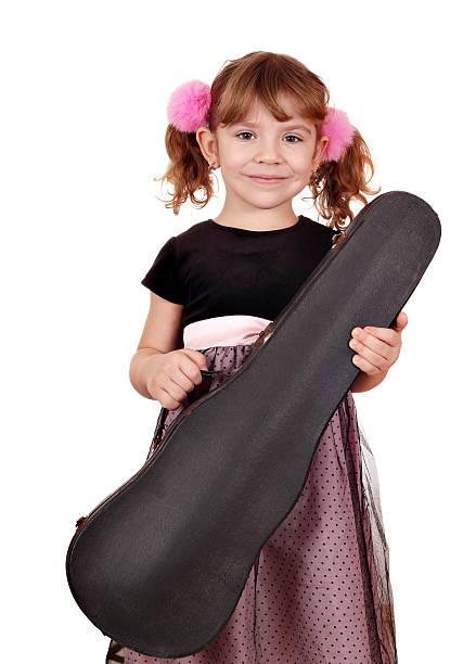 istock little girl holding violin case 177427045