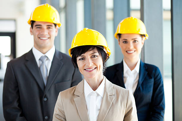 istock construction businessman and businesswoman 177427046