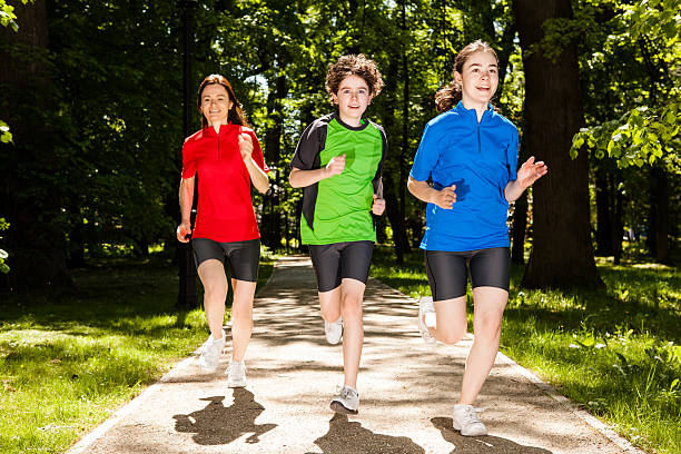 istock Mother with kids running outdoor 177428086