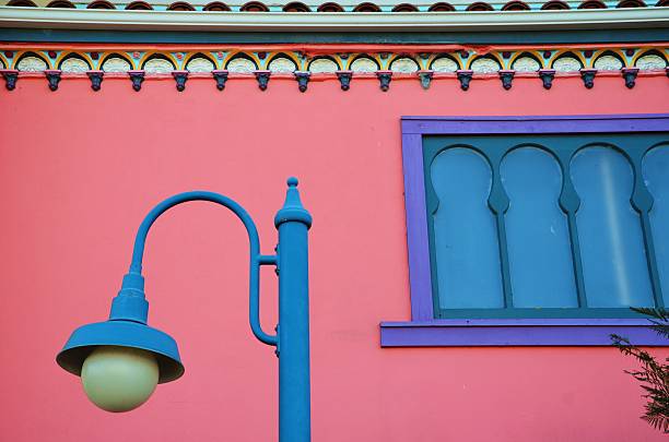 istock blue lamp post and pink building 177428288