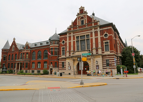 Indianapolis, IN, US-September 02,2014:Unidentified people renting Bicycles in front of Historical Athenaeum Building at Mass Ave