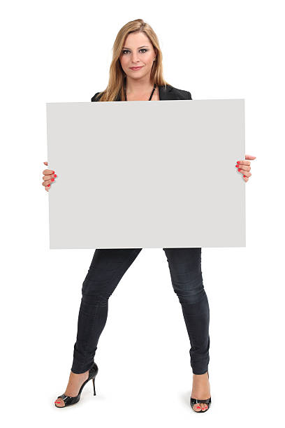 istock Blond female holding large blank sign 177428717