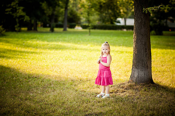 istock Beautiful little girl in a park 177428876