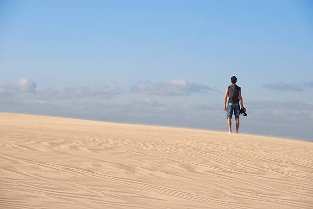 istock Photographer on the desert dunes 177429880