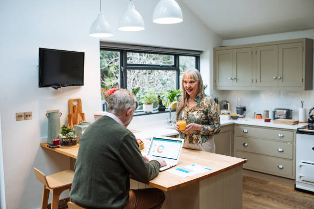istock Married mature couple using banking app at home and paying online. Seniors using secure internet protocol for fraud prevention 1774303182