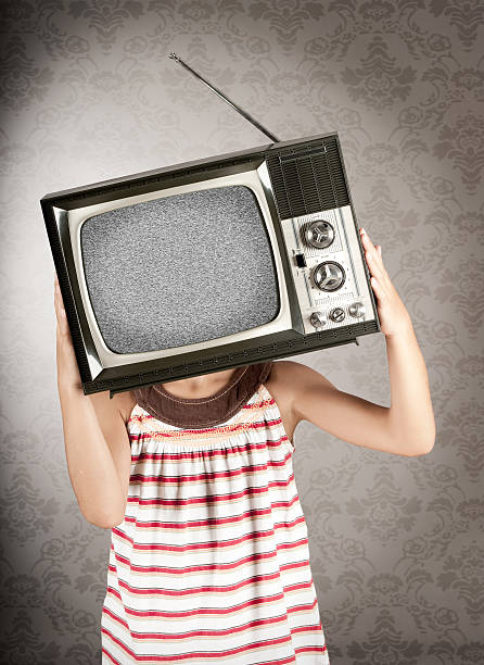 istock girl with television on her head 177430477