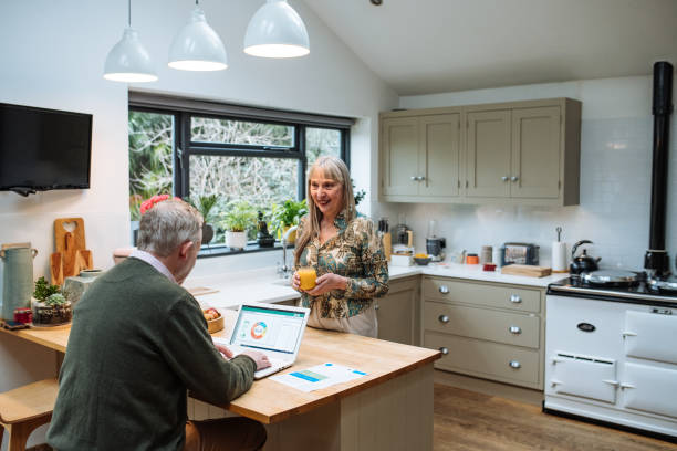 istock Married mature couple using banking app at home and paying online. Seniors using secure internet protocol for fraud prevention 1774304797