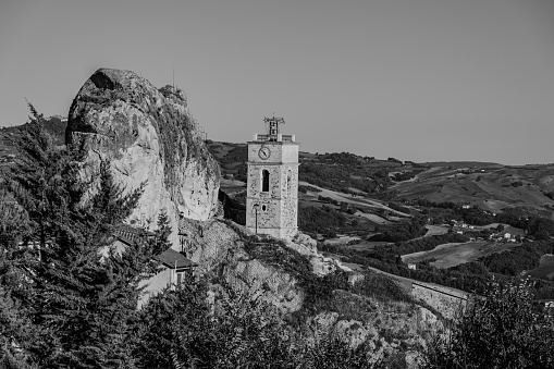 The name derives from stone, since it was built on a huge limestone formation, the Morgia, and of the adjective cupa, which in Latin means barrel.