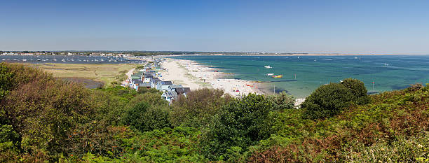 Mudeford Sandspit Panorama A sweeping panorama of the Mudeford sandspit on Hengistbury Head. christchurch england photos stock pictures, royalty-free photos & images
