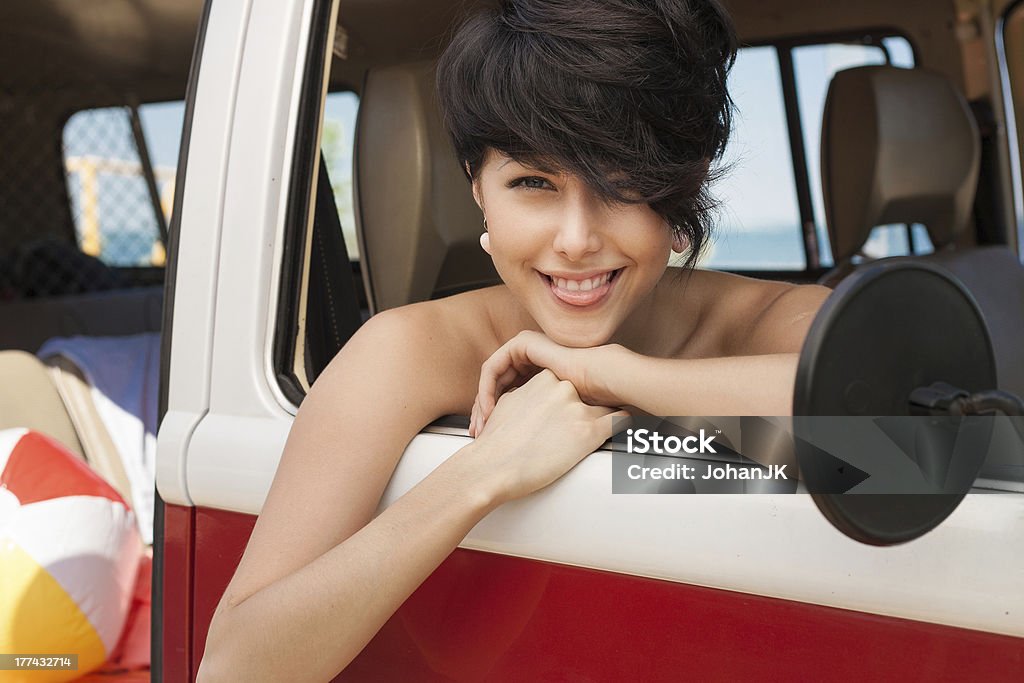 sunny beach Woman relaxing in car near the beach - outdoors Car Stock Photo