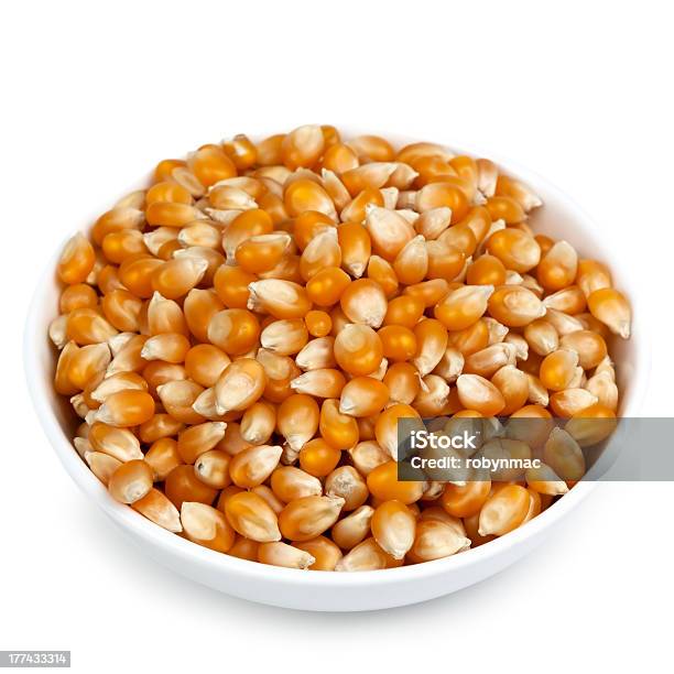 Bowl Of Popping Corn Over White Stock Photo - Download Image Now - Bowl, Corn, Corn Kernel