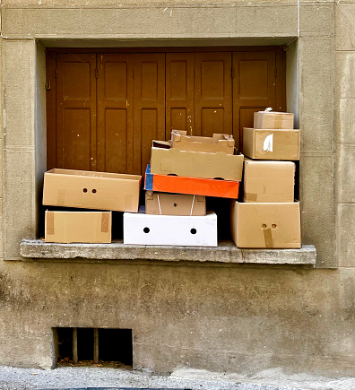 Cardboard boxes on a window sill