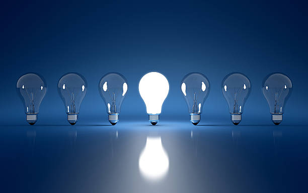 istock Picture with six light bulbs off and middle one on 177434726