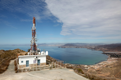 Communication tower with antennas at the Mediterranean coast in Spain