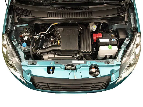 A Japanese compact car with engine bay exposed.