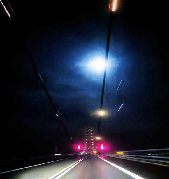 istock Crossing the Great Belt Bridge beneath the moon 1774366486